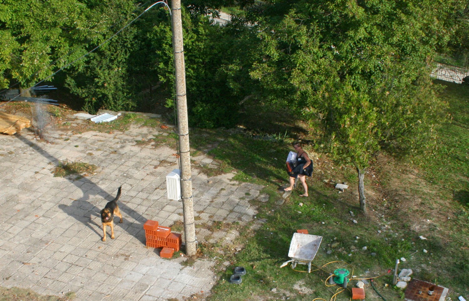 Carrying the rugs in after our sunbathing Carrying the rugs in after our sunbathing