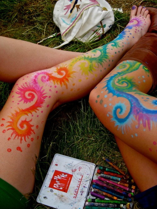 Watercolor crayon tattoo on whole legs