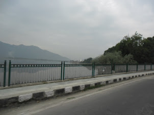 Crossing the Dal Lake bridge in Srinagar city.
