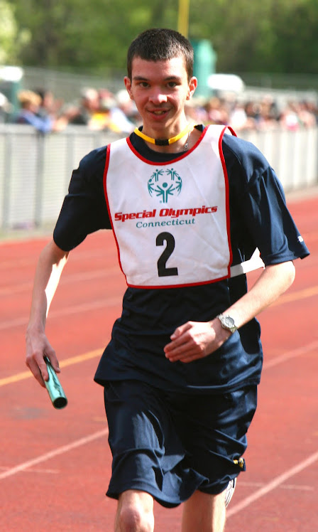 SIMSBURY SPECIAL OLYMPICS ATHLETE  HEADS FOR THE FINISH LINE!