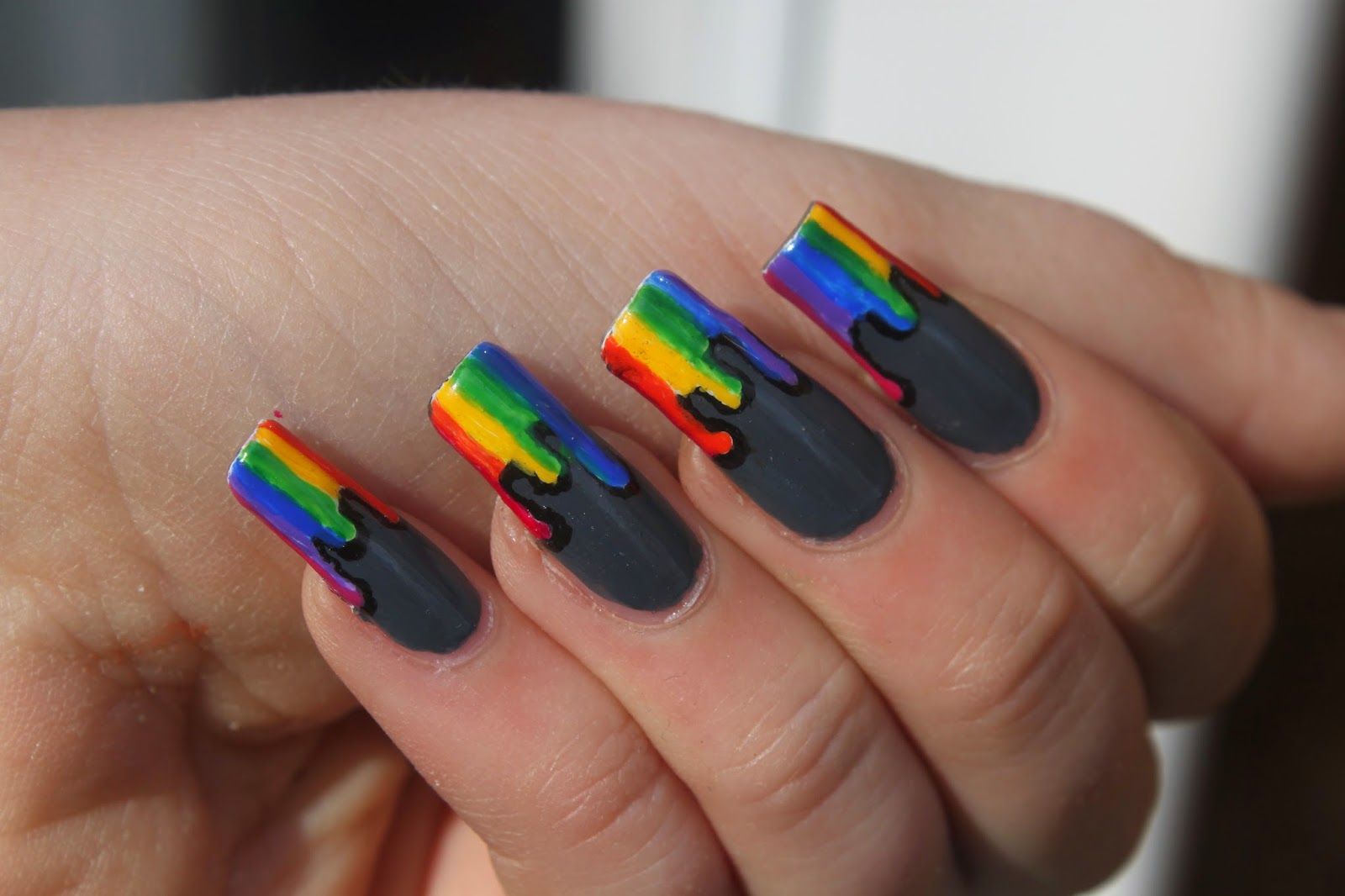 10. Funky Black and Rainbow Drip Nail Art - wide 2