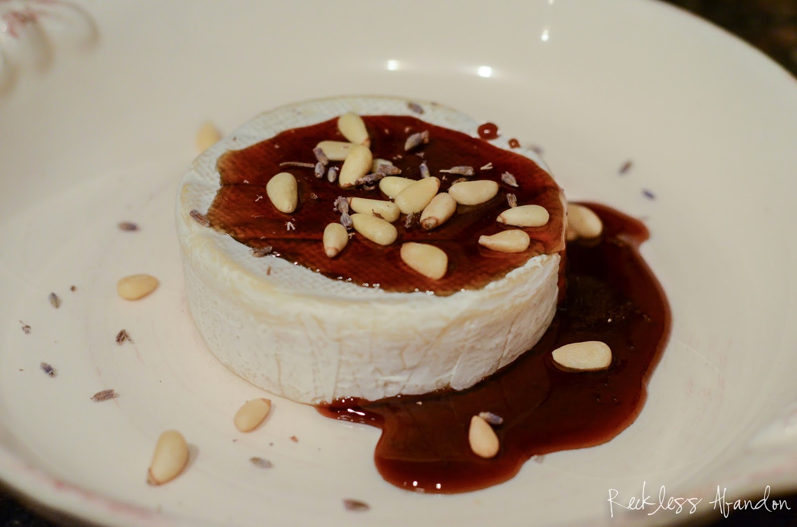 Reckless Abandon Baked Brie with a Brown Sugar Brandy Sauce