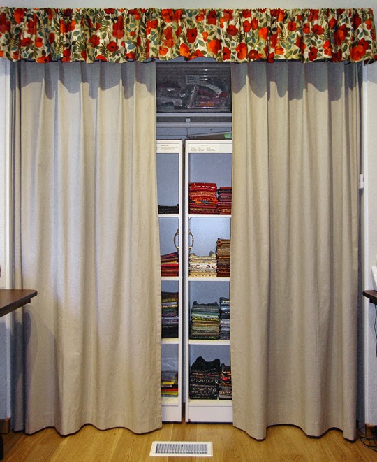 frabric storage system: closet curtains close to protect fabrics from light damage and dust
