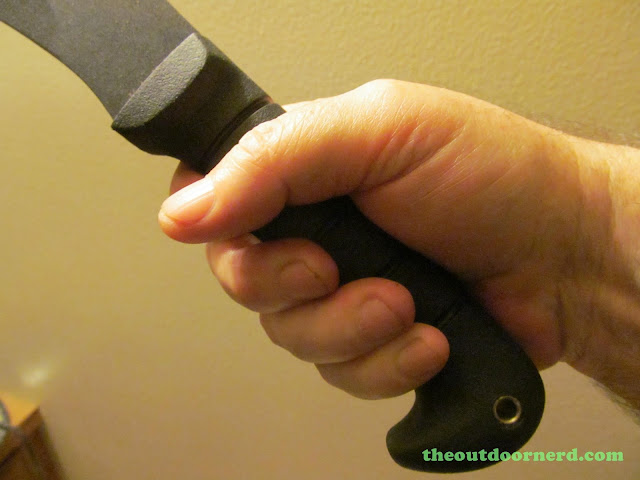 Ka-Bar Kukri Machete - Closeup In Medium Size Hand Ka-Bar Kukri Machete - Closeup In Medium Size Hand