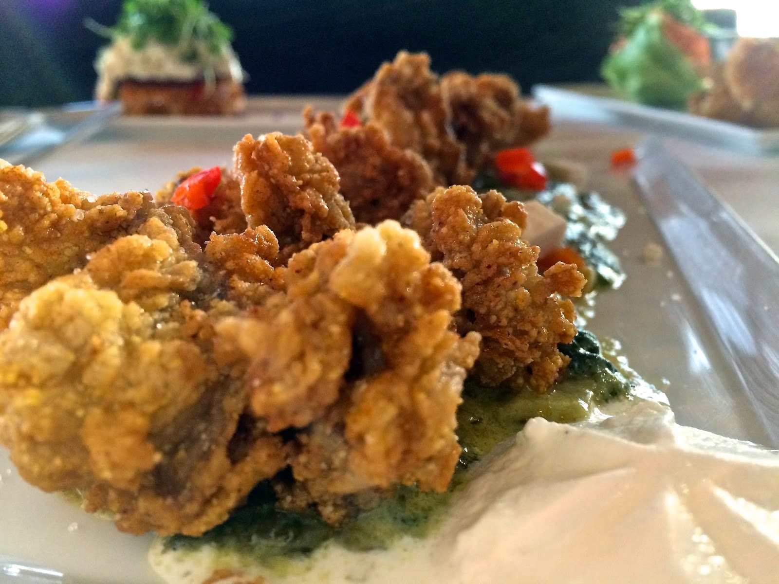 Gulf Oysters with Rockefeller Pernod, Wilted Spinach, and Ricotta Salata 