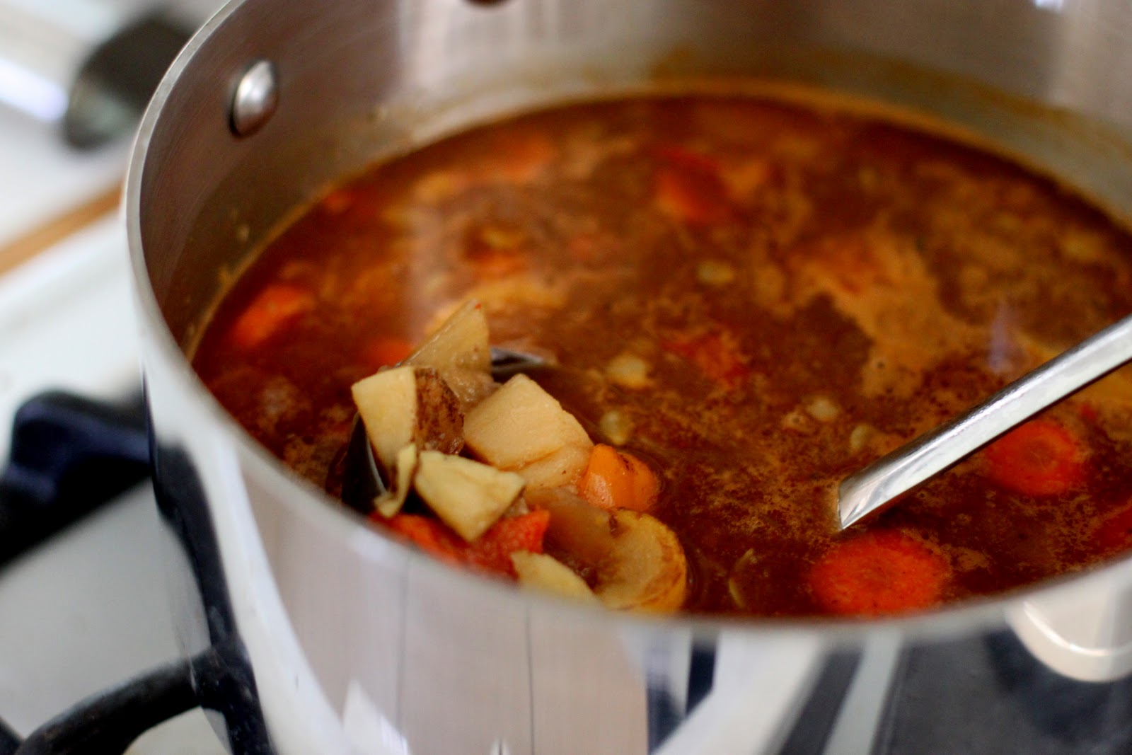literally, a spoonful Beef Stew Over Cheese Grits