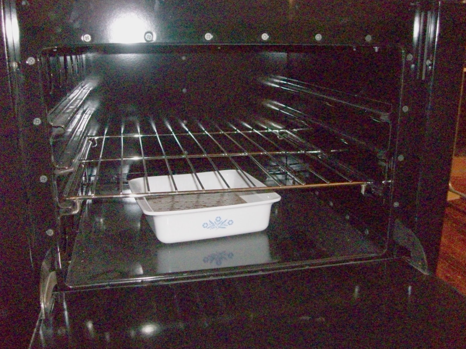 Homesteading Wife Baking in a Wood Cookstove