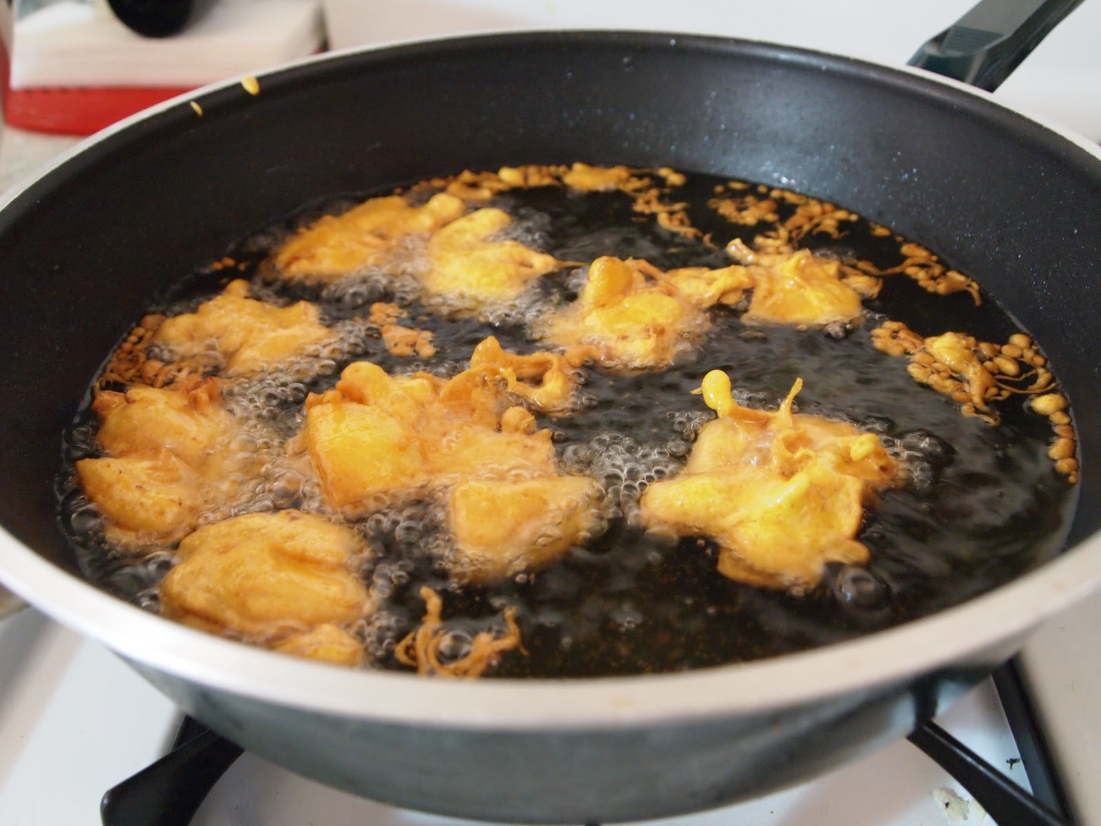 DOS HERMANOS GO EVERYWHERE, EAT EVERYTHING HOME COOKING ONION BHAJI