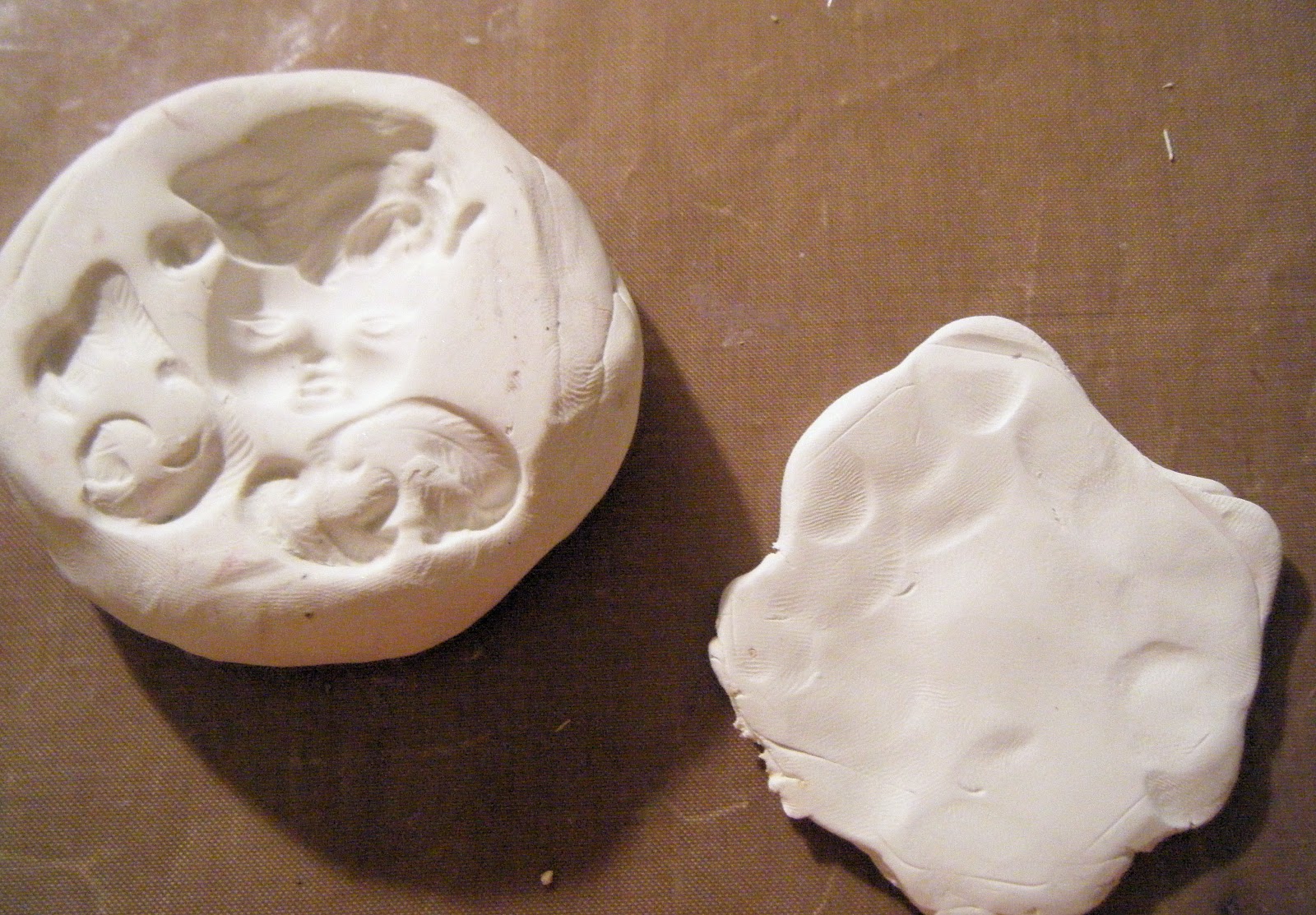 Again I smoothed out the top of the clay chunk and mited the mold