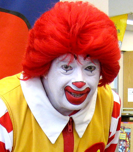 Ronald McDonald performing at a party
