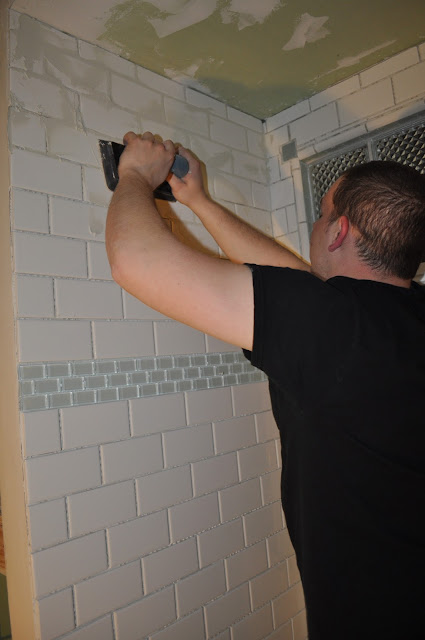 bathroom, reno, subway tile, sea glass tile, glass tile, white grout, grout, glass block window, hex tile