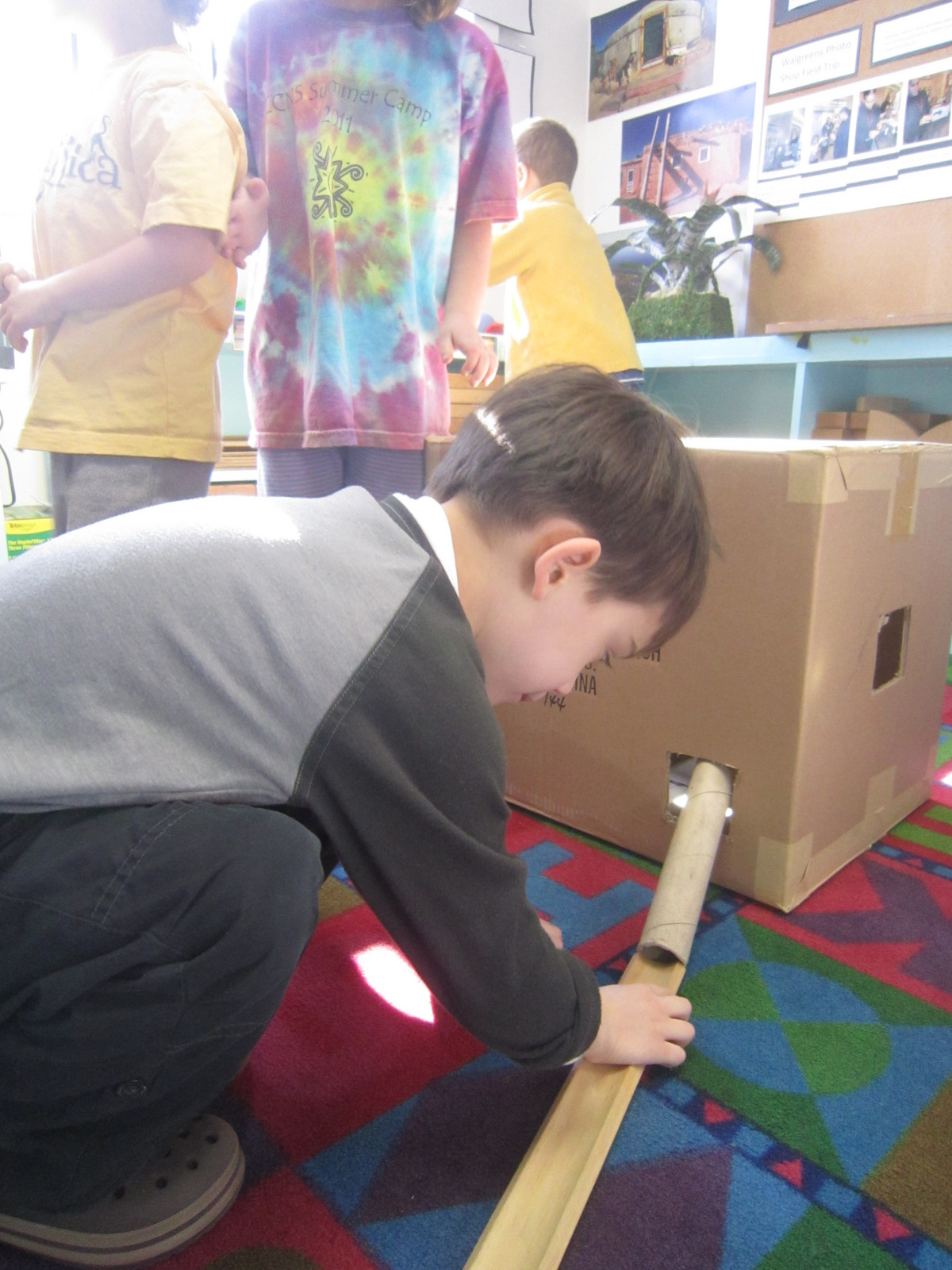 Playfully Learning Boxes, tunnels and tubes