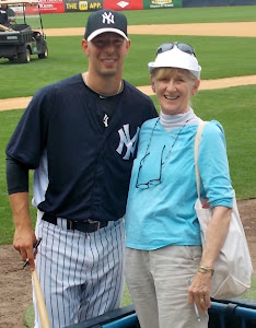 Yankee relief pitcher has my bat in his right hand. He signed for everyone who waited.  Nice.