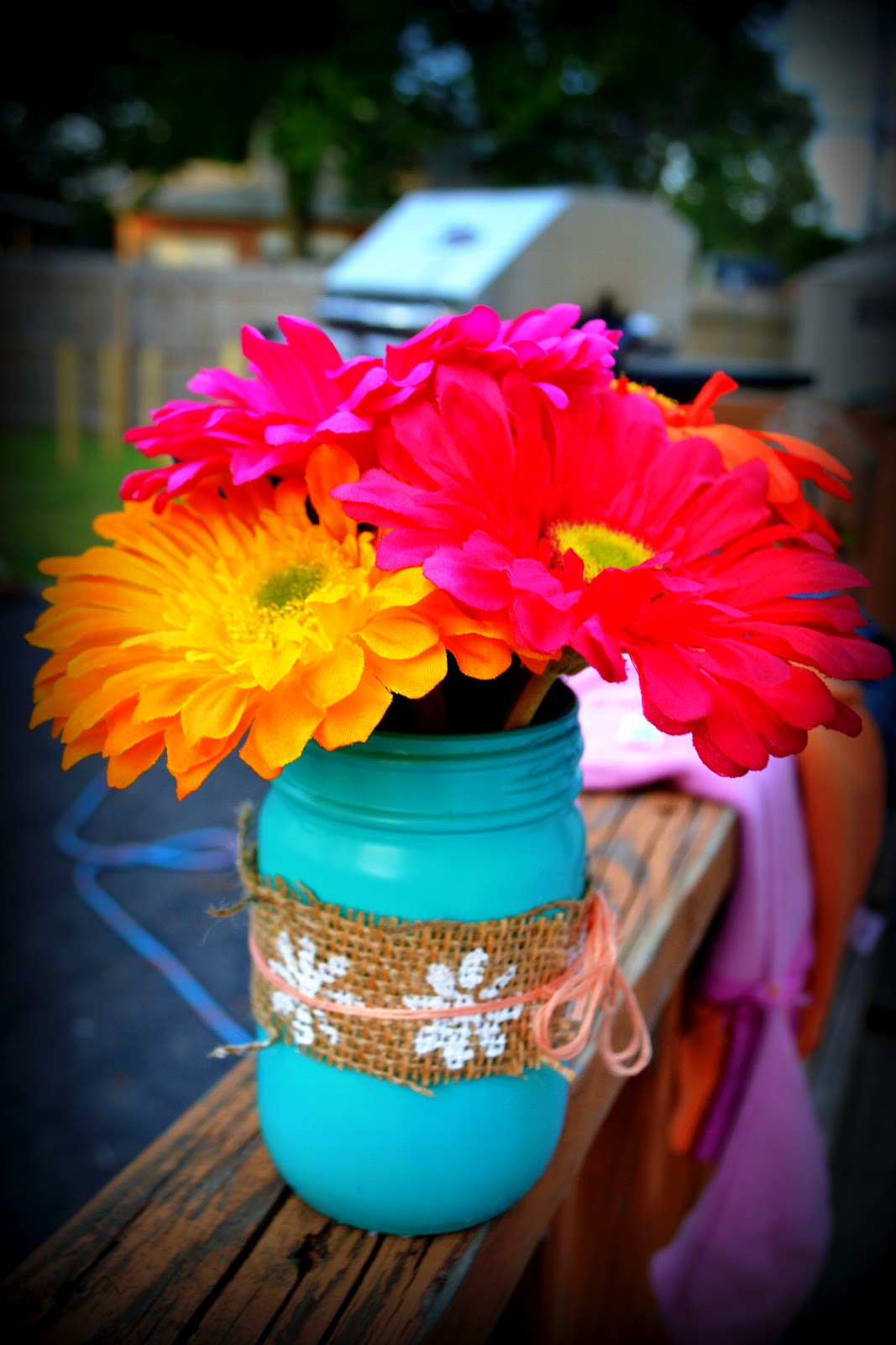 mason jar vase. bold flower. Mason jar vases, Jar vase, Table decorations