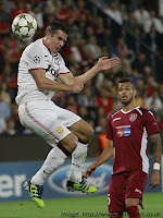 Robin van Persie scoring a goal with his shoulder