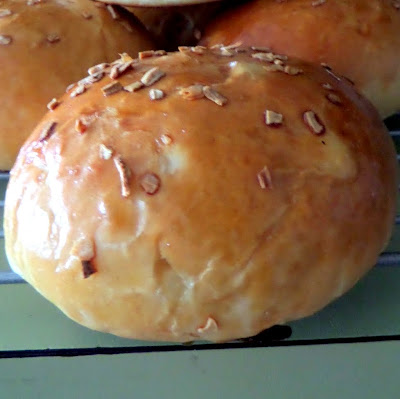 Onion Buns:  Soft and fluffy buns studded with onions