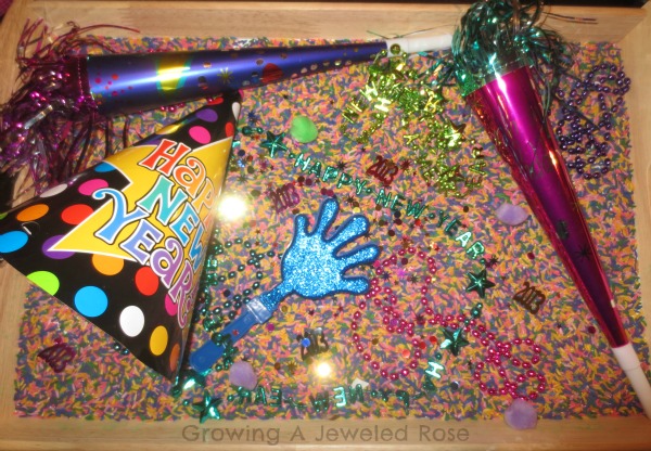 New Year's Eve Sensory Bin by Growing a Jeweled Rose