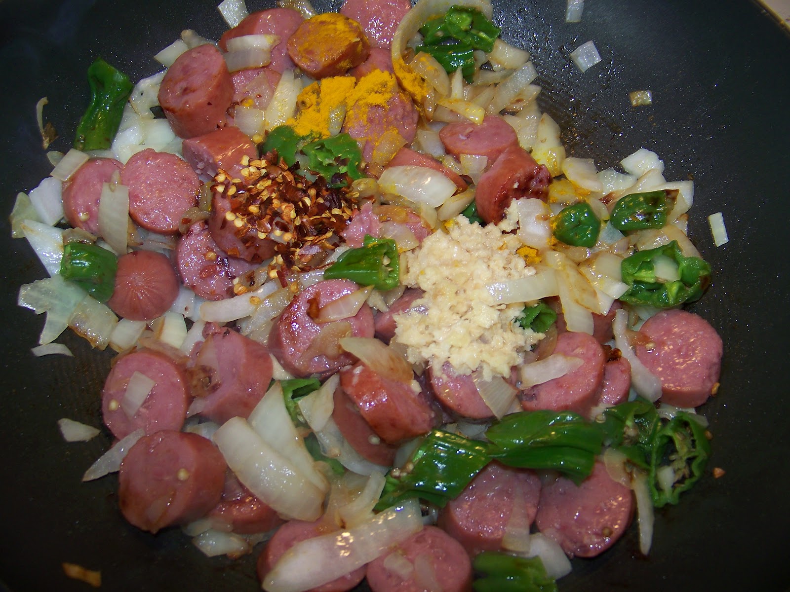 Kitchen Simmer Spicy Kielbasa, Tomato and Chili Curry