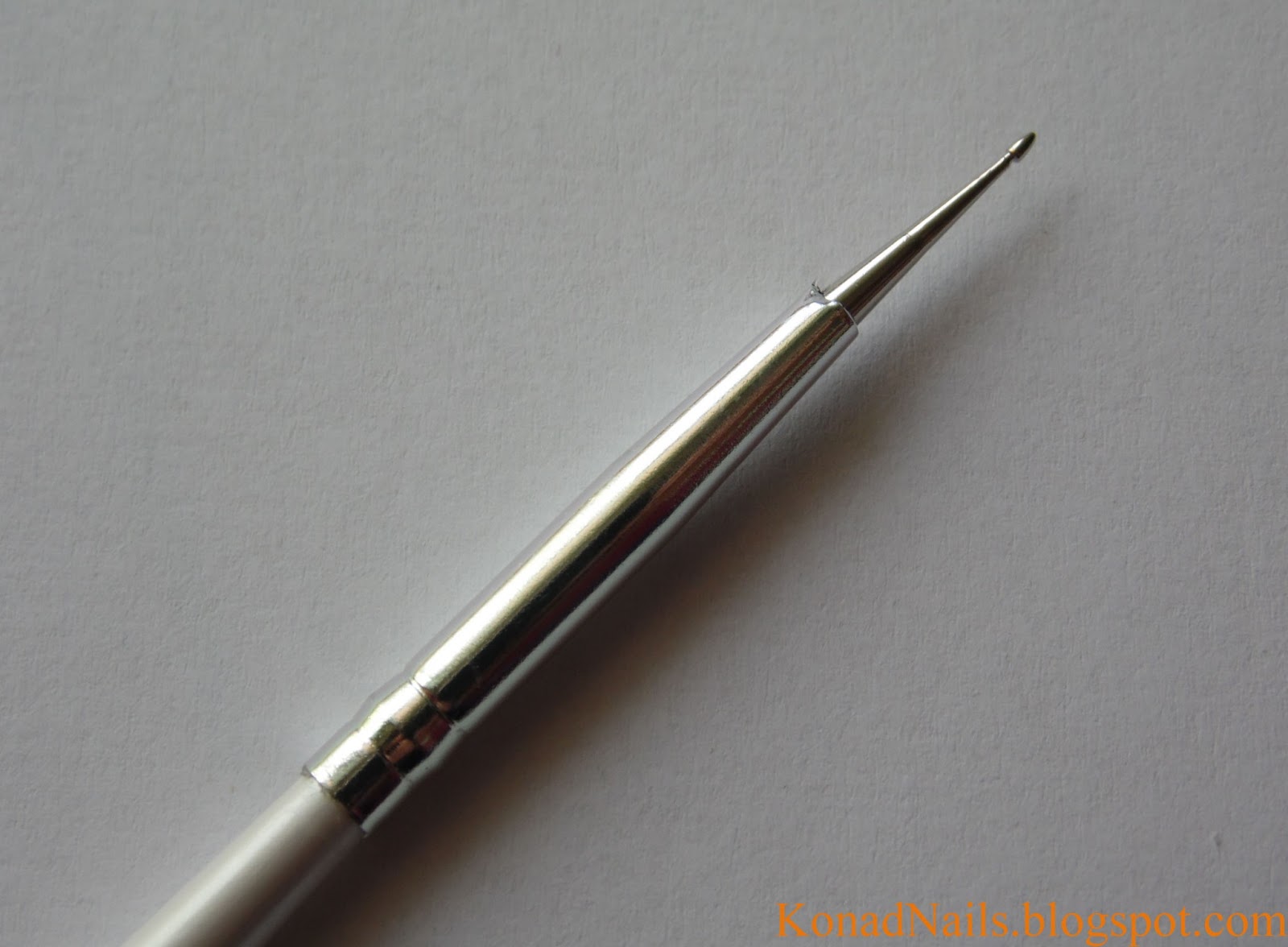 Konad Addict Striped nail art using fan brush