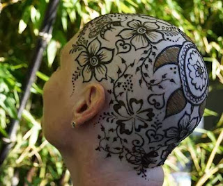 نقره لتكبير أو تصغير الصورة ونقرتين لعرض الصورة في صفحة مستقلة بحجمها الطبيعي