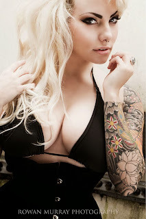 big boobs blonde shows tattoos
