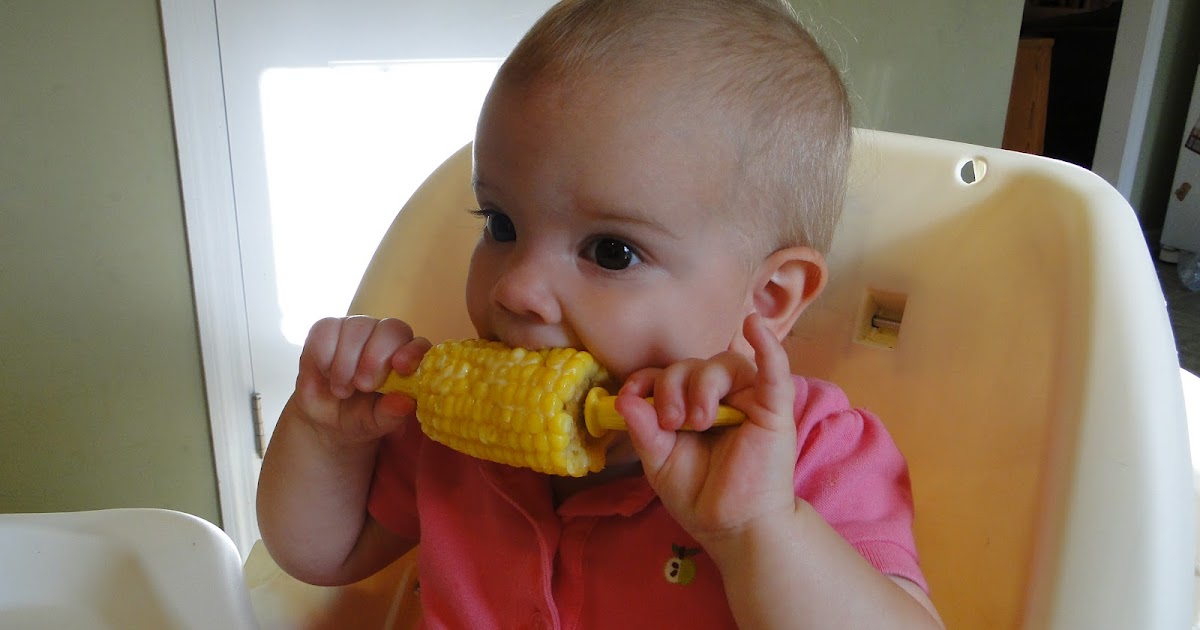 The Camp Family Eating Corn on the Cob