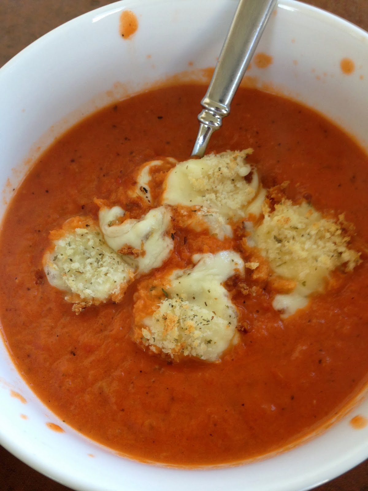 Savory Sweet and Satisfying Creamy Tomato Soup with Baked Mozzarella Balls