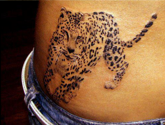 Dotted tiger tattoo on side body