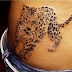 Dotted tiger tattoo on side body