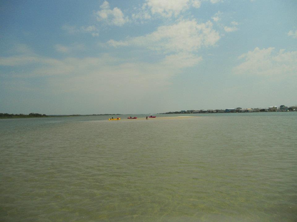 Go Outside Girl Kayaking the coast Topsail Island, NC