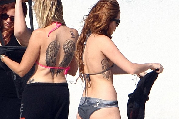 30 Sexy Miley Cyrus Tattoos Pictures Gallery.