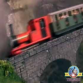 Fast roller coaster ride Rheneas the tank engine splashed under a waterfall happy children laughing