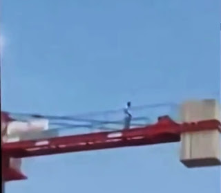 A Muslim Praying on the Crane in Turkey