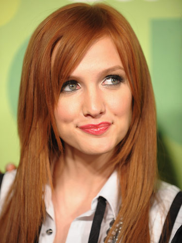 Ashlee Simpson's hair is an extremely bright shade of red that somehow still