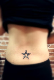 An exquisite star tattoo on the back