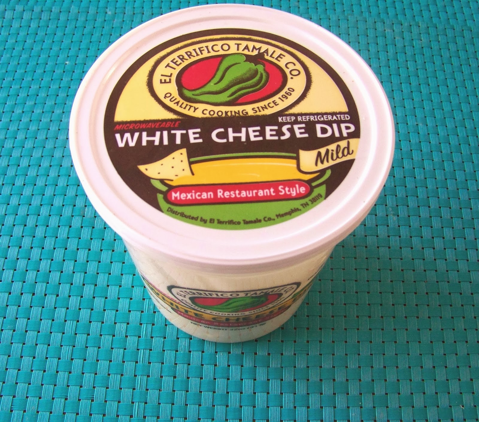 white cheese dip in a tub