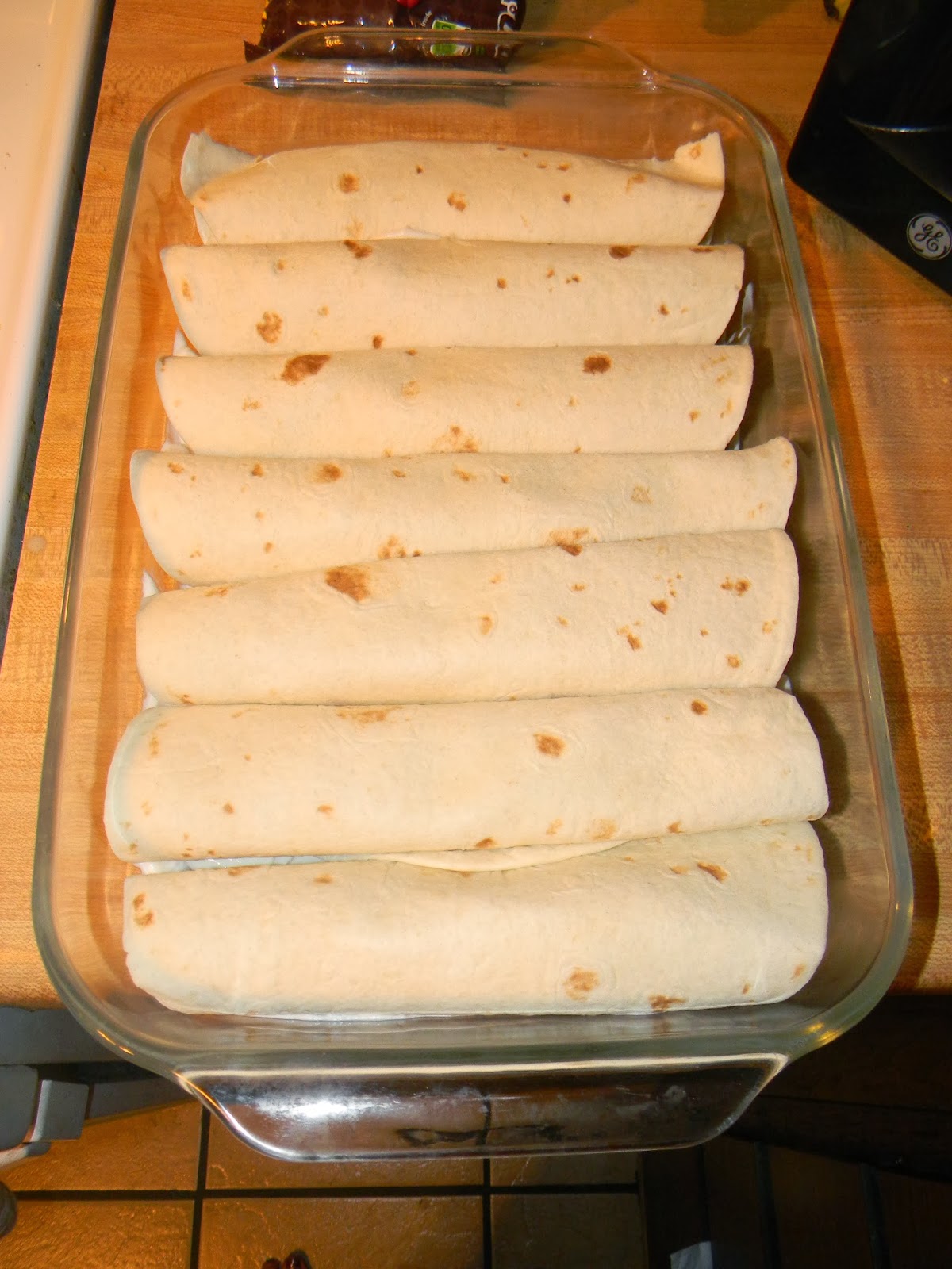 Growing to Four Wet Burrito Casserole