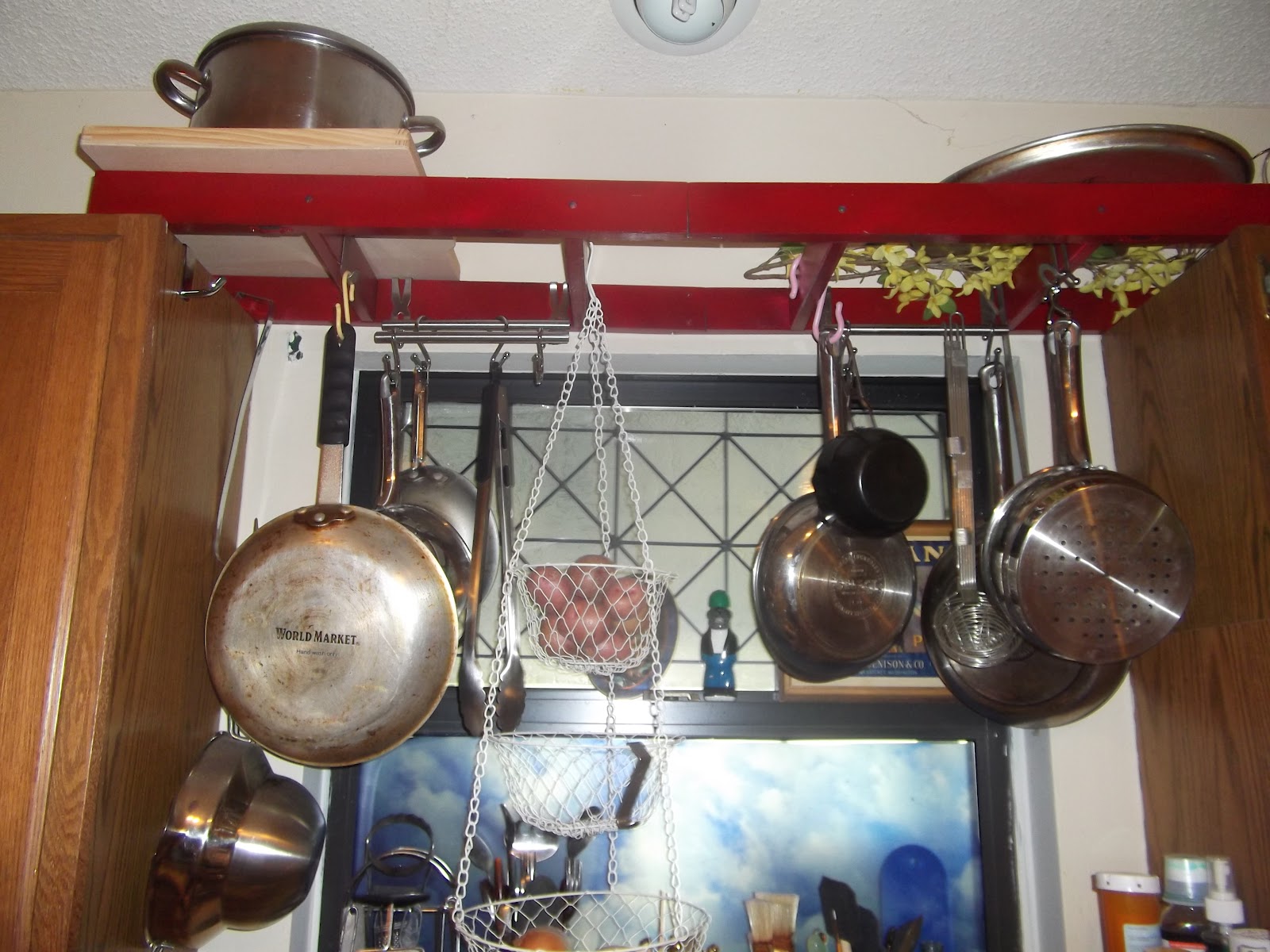 the Wreath Witch pot rack & decoupage bed frame