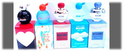 Image of five Moschino miniature perfumes, from left to right: Cheap and Chic Moschino, I Love Love, Glamour, Cheap and Chic Light Clouds, Toujours Glamour.