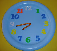 افكار تعليميه Clock+with+pretzel+hands