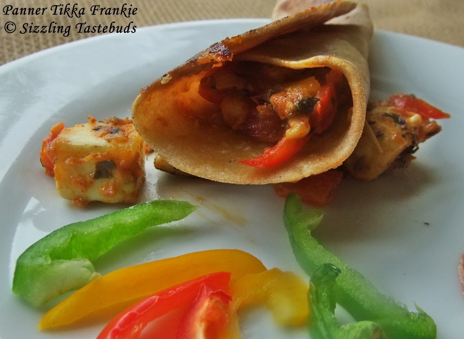 Sizzling Tastebuds Paneer Tikka Frankie Cottage cheese stuffing in