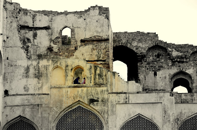 a couple in ruins of golconda fort