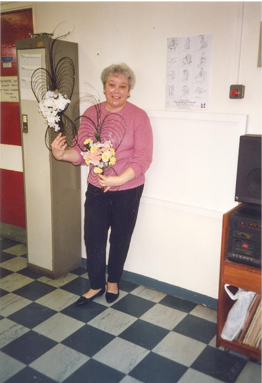 Pat Preece with flowers.