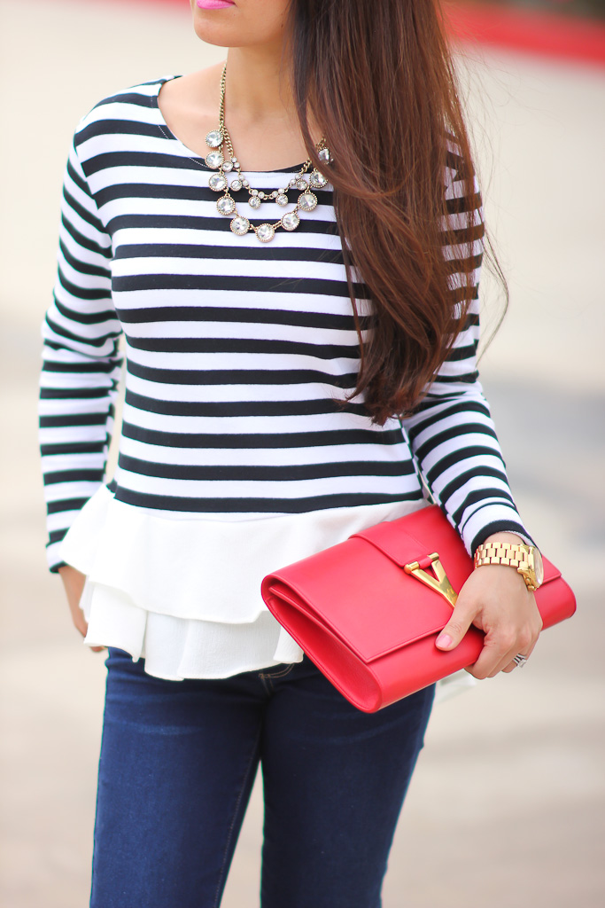 ysl polka dotted clutch in the shape of a rose  