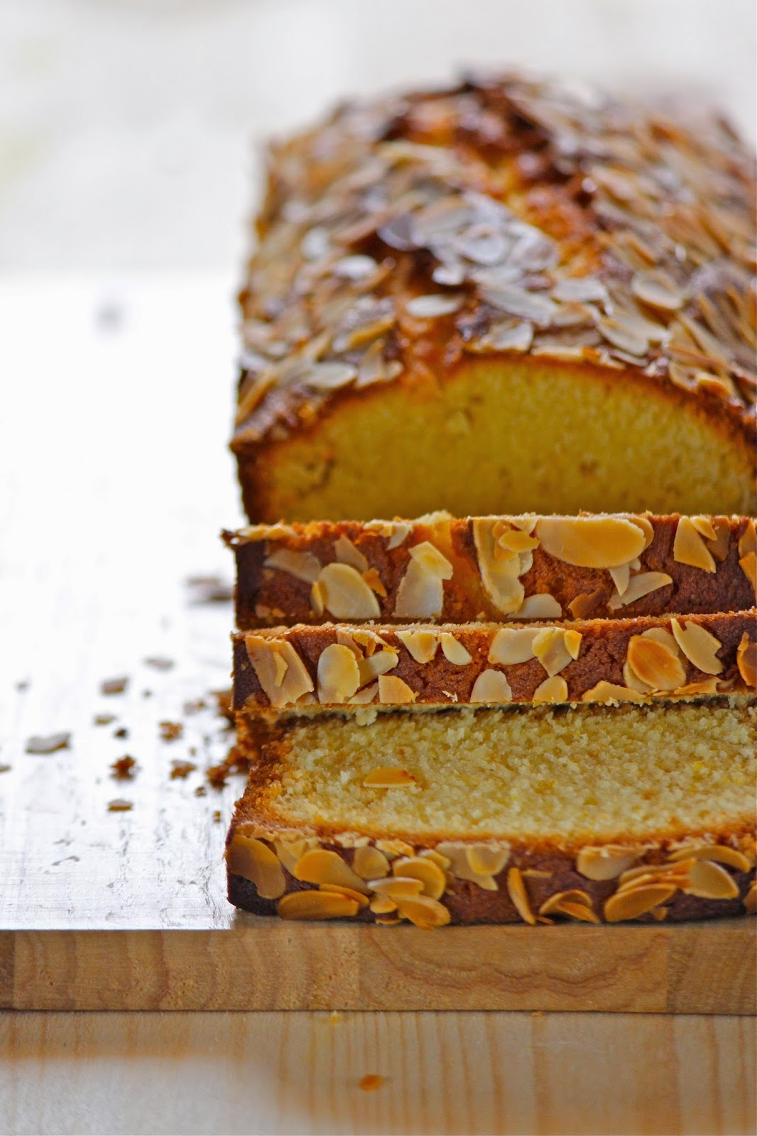 Plateful Orange Almond and Yogurt Loaf—light, moist, and deliciously
