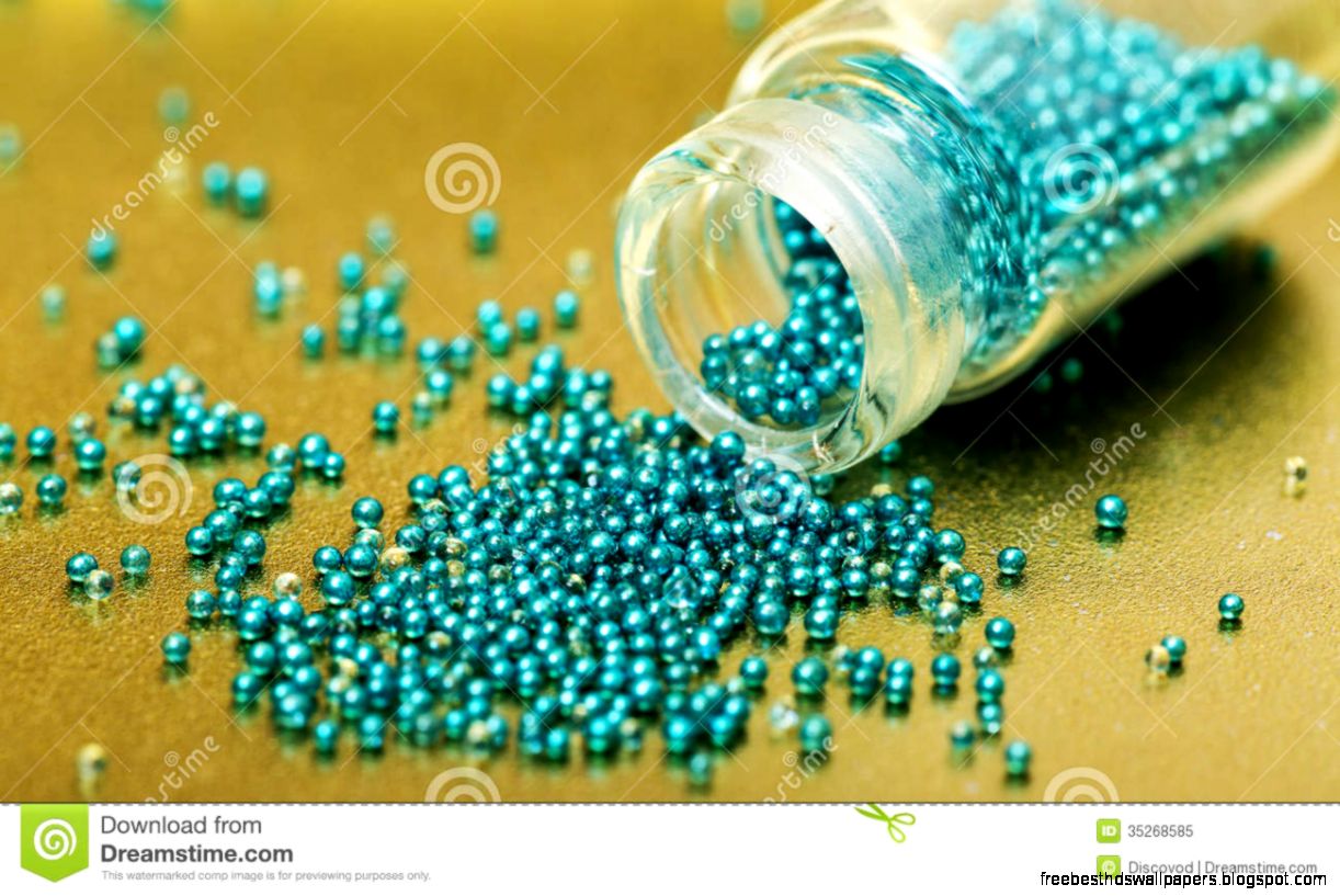 Small Glass Jar Filled With Green Balls Of Bead Royalty Free Stock Small Glass Jar Filled With Green Balls Of Bead Royalty Free Stock