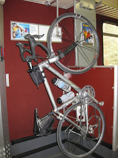 pep's bike suspended in a bike car on a Swiss train.