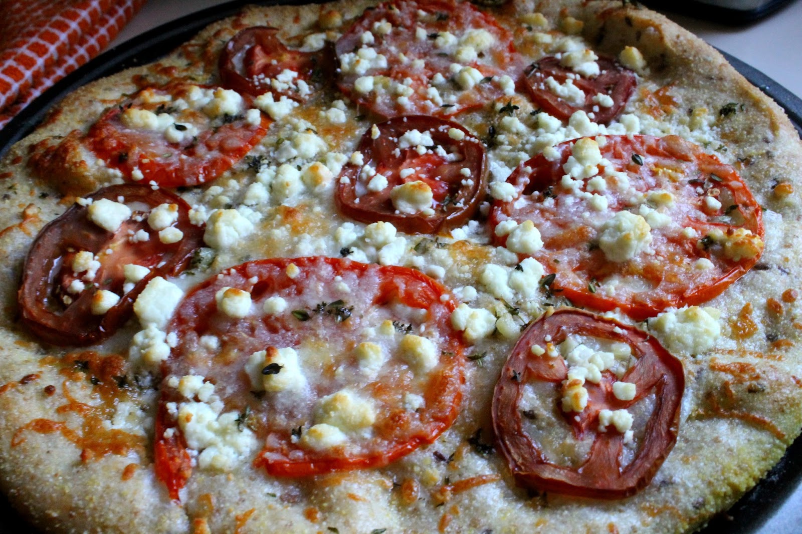 the simple treat GOAT CHEESE & TOMATO PIZZA
