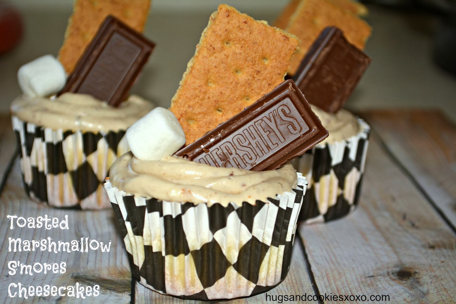 MINI S'MORES CHEESECAKES TOPPED WITH TOASTED MARSHMALLOW BUTTERCREAM