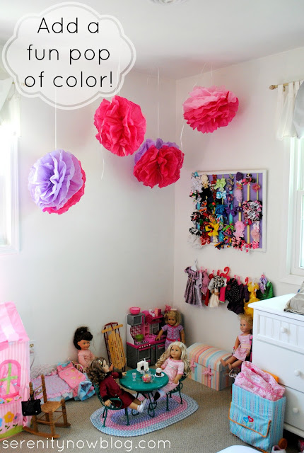 Hang Tissue Paper Pom Poms from the Ceiling for a Pop of Color, from Serenity Now